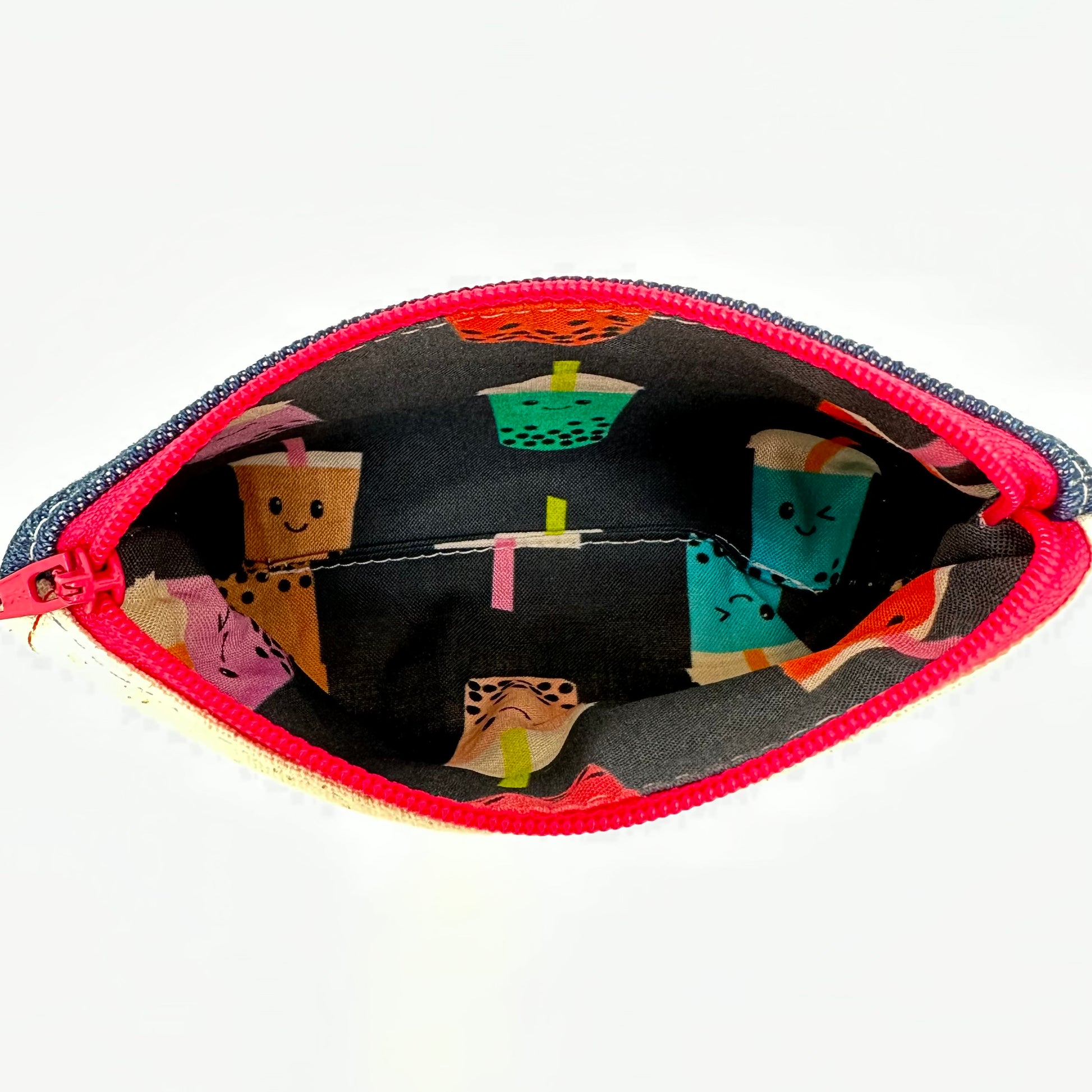 Inside of boba pouch showing fabric with boba print.