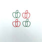 4 paperclips in the shape of apples. 2 red and 2 green.
