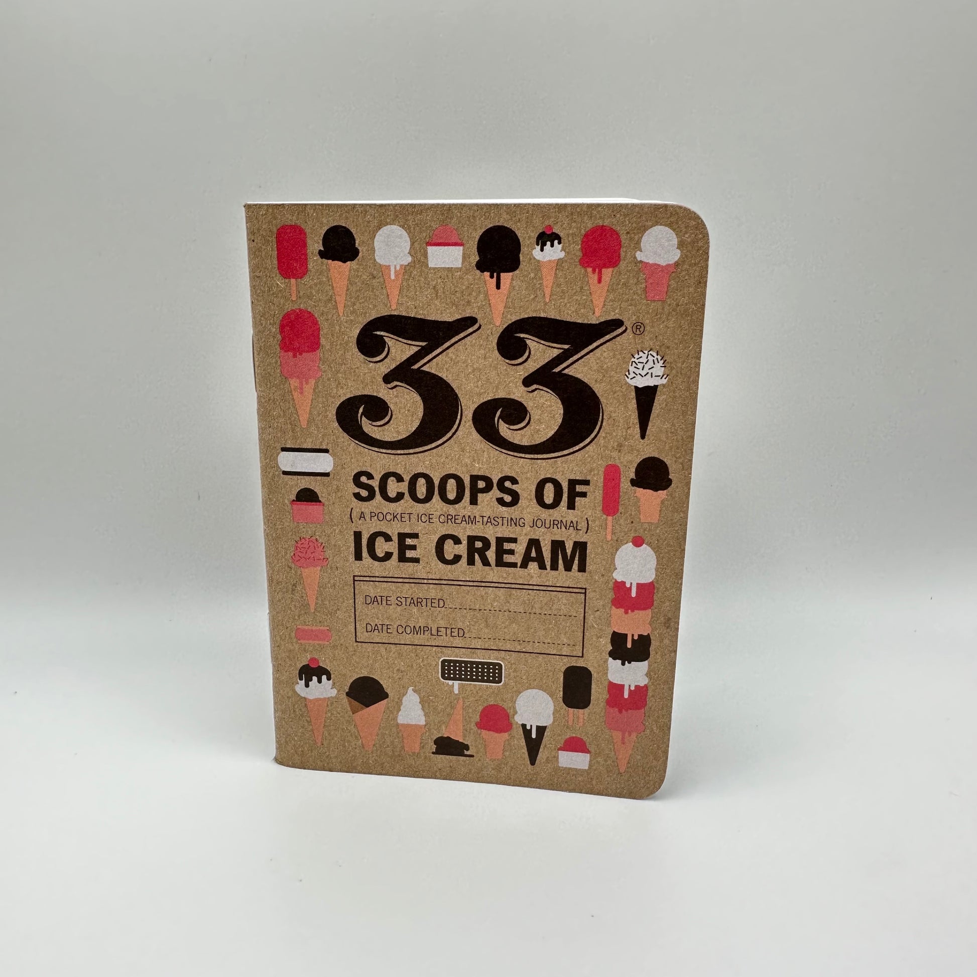 Cover of 33 Scoops of Ice Cream, a pocket ice cream tasting journal. A selection of different ice creams adorn the cover.