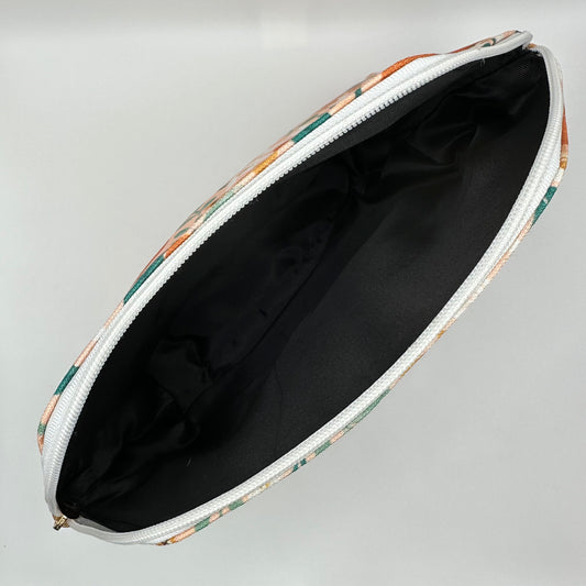 Inside of pouch to show black satin lining.
