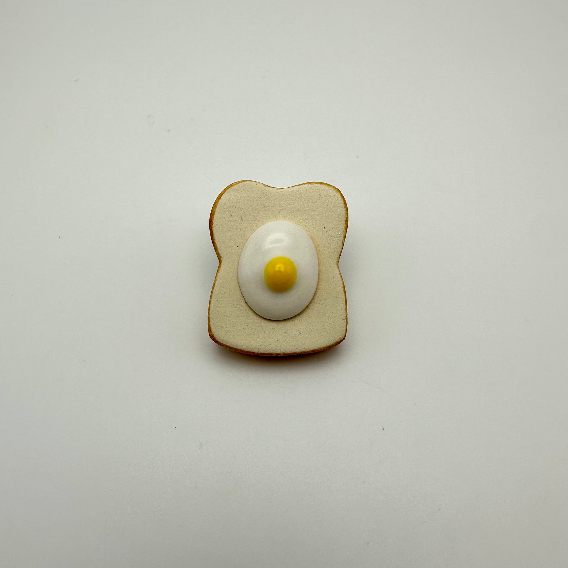 Egg on toast chopstick holder