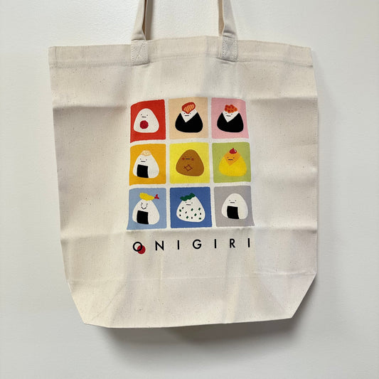 Onigir tote bag with 9 different tiles featuring different flavors of onigiri. 