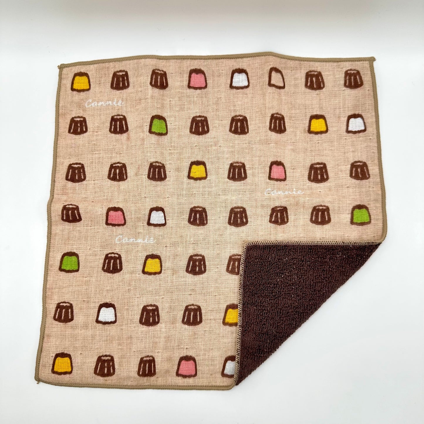 Hand towel with assorted canelés.