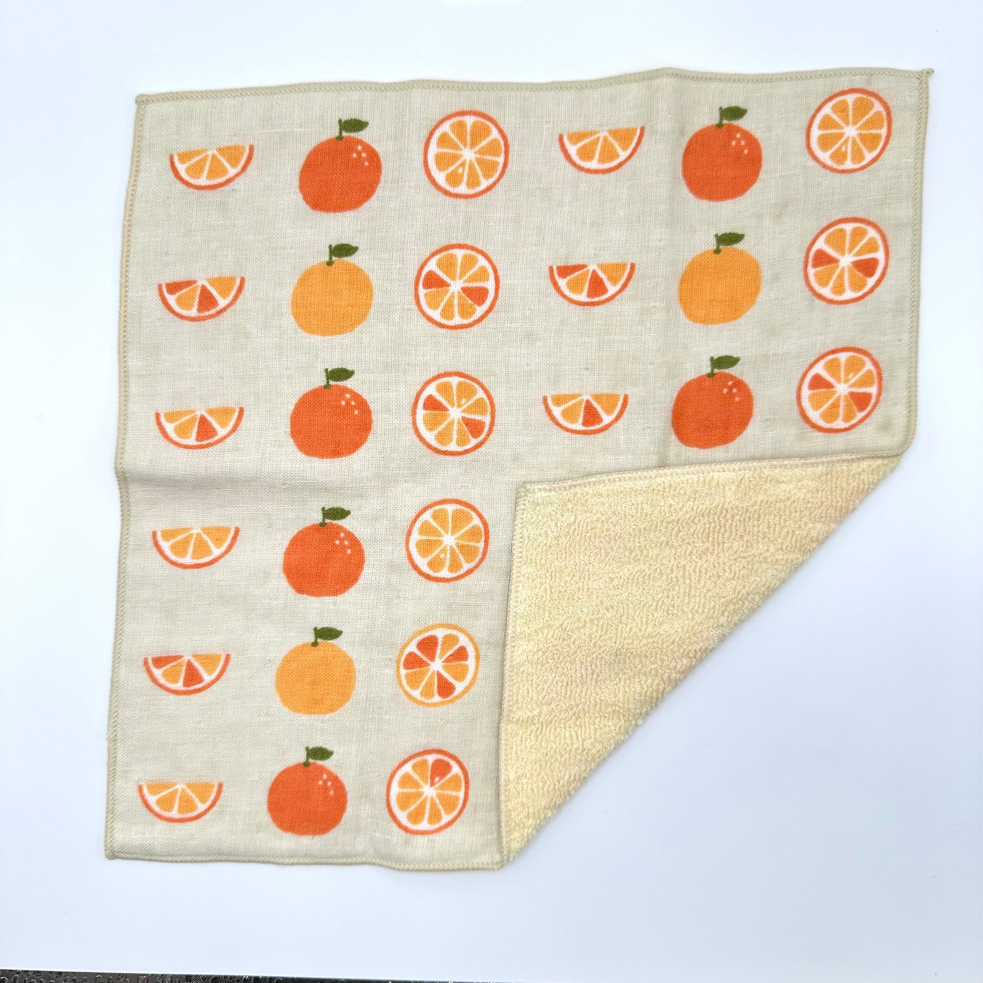 Hand towel with assorted oranges 
