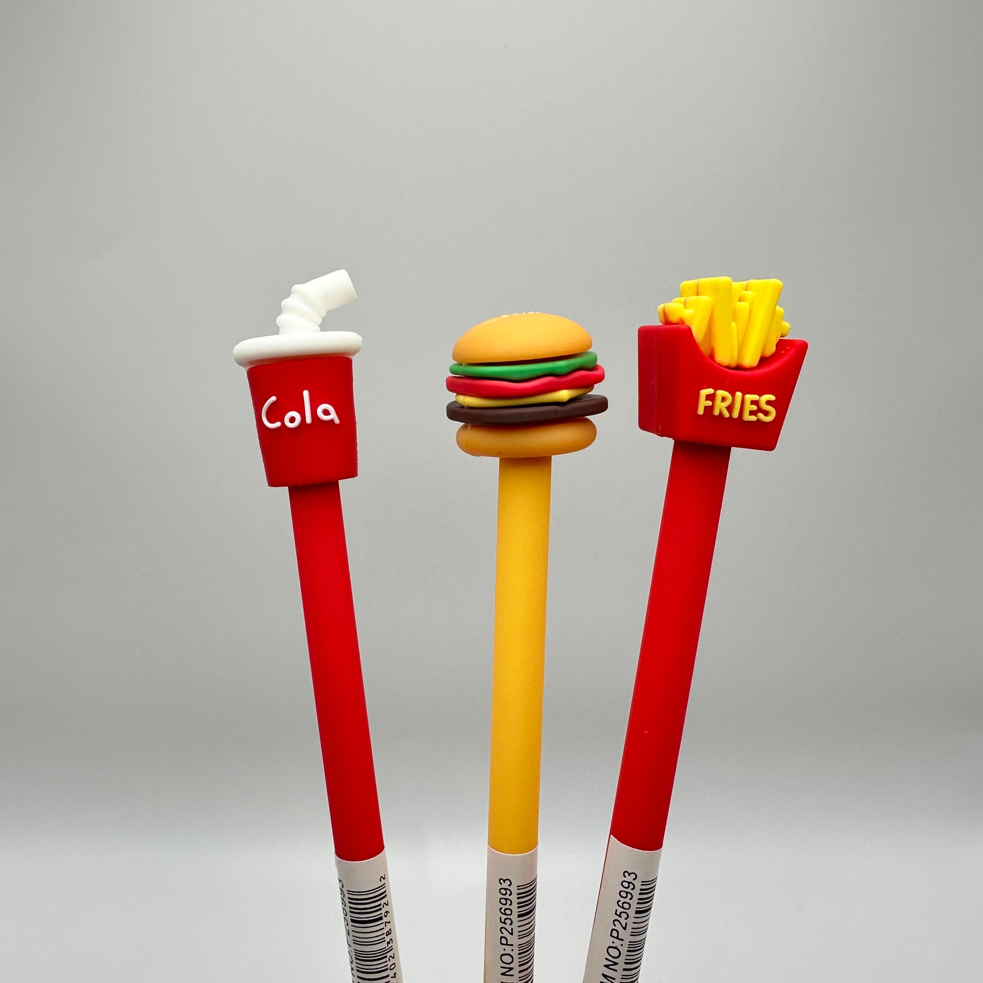Three fast food pens: Cola, Cheeseburger, Fries.