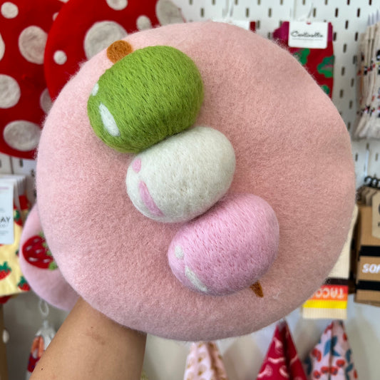 Pink wool beret with wool-felted Japanese Dango in green, white and pink on a skewer.