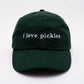 Green cap with 'i love pickles' text on a white background