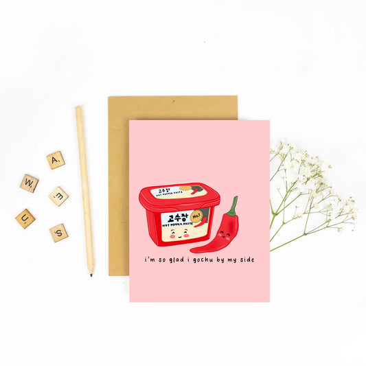 Pink card with korean chili paste on the front. Words say "i'm so glad I gochu by my side"
