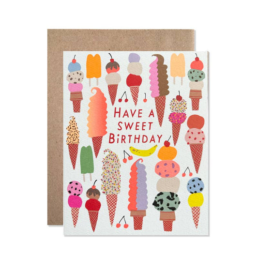 Greeting card with ice cream cone illustrations and 'Have a Sweet Birthday' text, featuring a brown envelope.