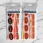 Two packages of Innuendo's Deli suggestive stickers on a marble background