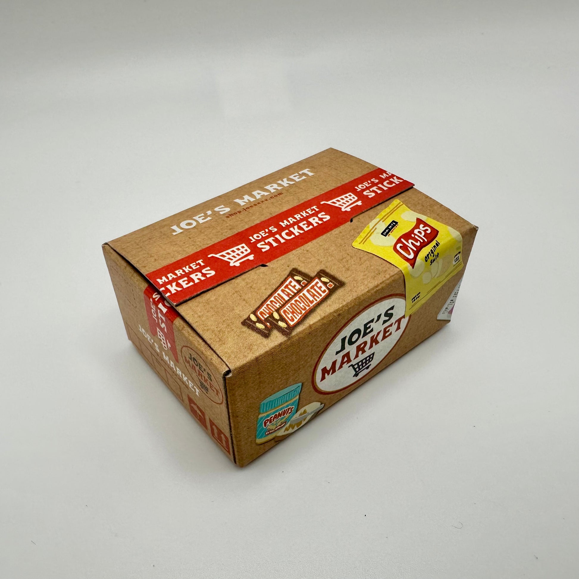 LIttle box that looks like a market crate full of food and goodies.