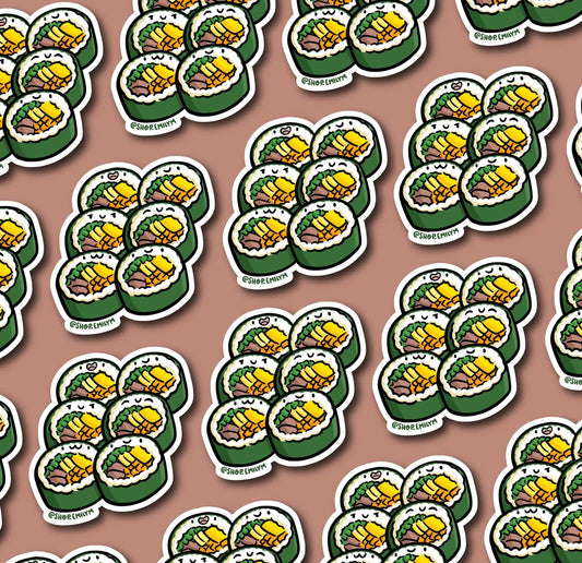 A repeating pattern of die-cut stickers featuring cartoon kimbap rolls, shown on a solid dusty pink background. Each sticker has a white border