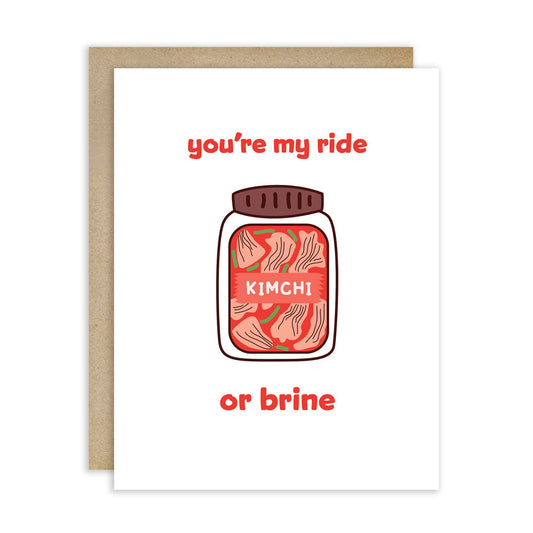 Greeting card with kimchi plastic tub illustration and text 'you're my ride or brine' on a white background