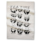 Tea towel with black and white illustrations of cats in teacups and 'TEA TIME' text.
