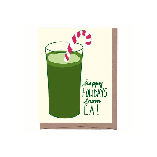 Greeting card with a green drink and candy cane, featuring 'happy holidays from LA!' text.