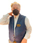 Large pretzel pin worn on a man's vest 