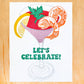 A square white art print or card featuring a colorful cocktail illustration with shrimp, a lemon slice, green garnish, and the text 'LET'S CELEBRATE!' in green, displayed on a light wood background.
