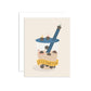 A greeting card featuring a cute illustration of a boba cup with tiny tapioca balls on the lid and straw, and a yellow banner reading 'LET'S PARTY'. A white envelope is placed behind the card on a clean white background.