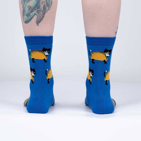 Model wearing blue taco cat socks