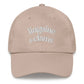 Beige cap with 'linguine & clarus' text on a white background