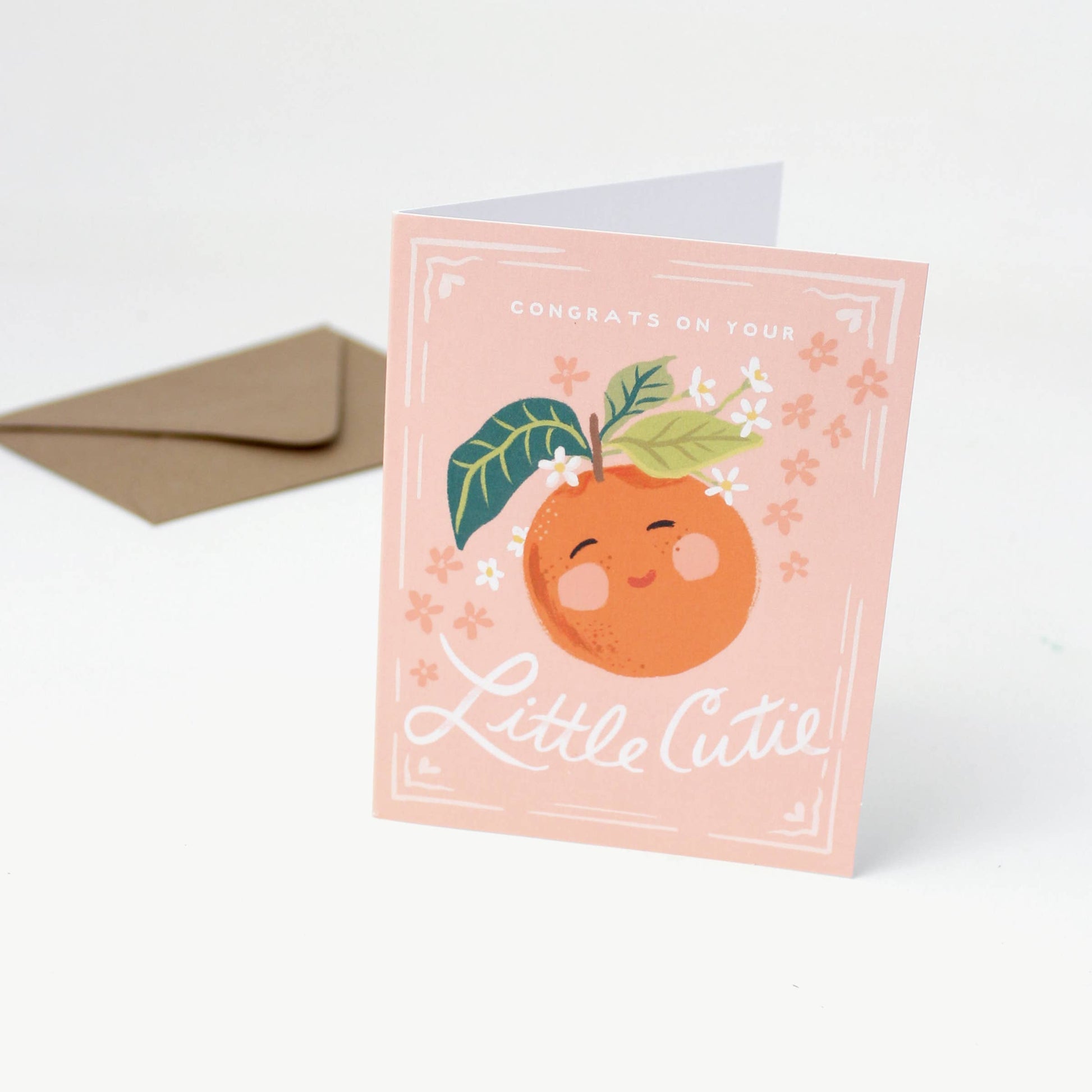 baby shower card with an orange illustration and text on an orange background