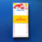 Notepad with lobster design and 'Pier Six Press' branding on a blue background