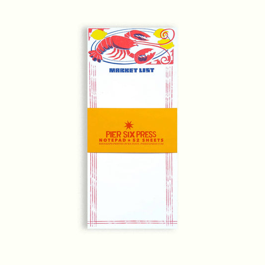 Notepad with lobster design and 'Pier Six Press' branding on a white background