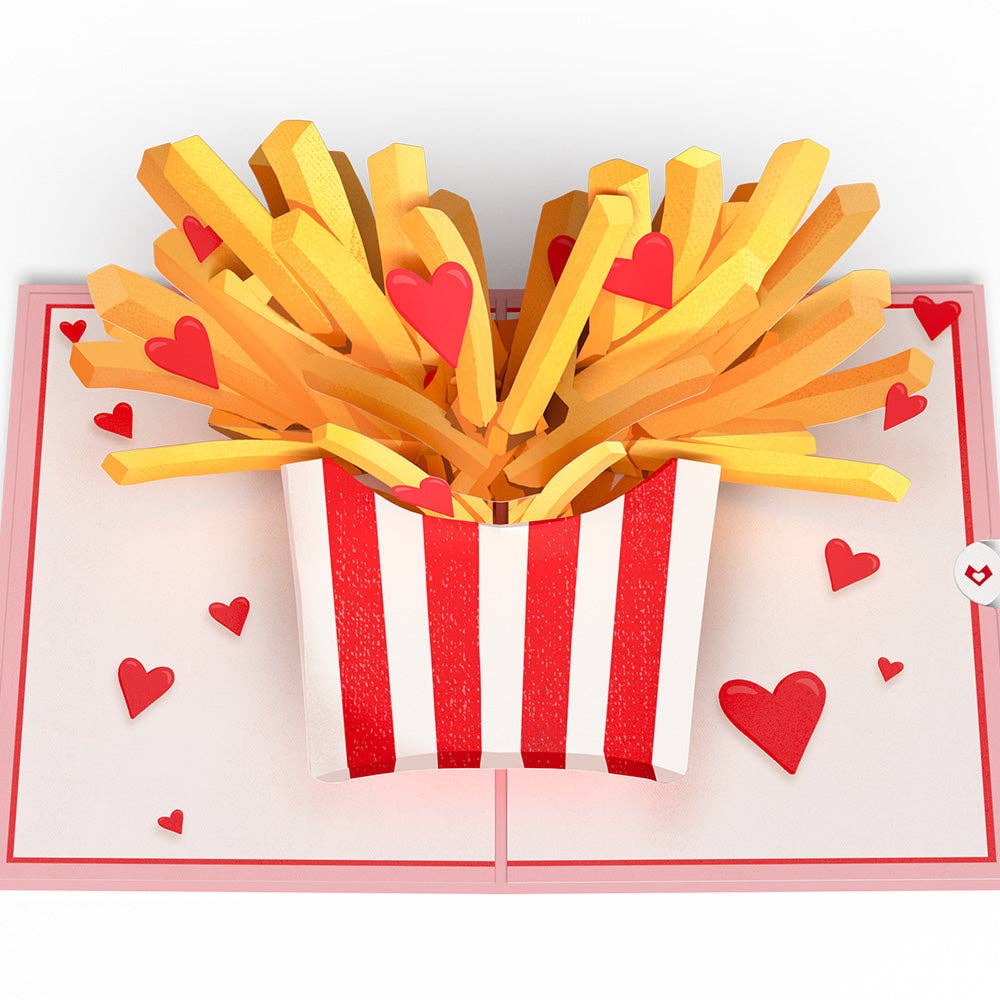 Close up of interior of the fries card that has fries and hearts popping out of a striped fries container.