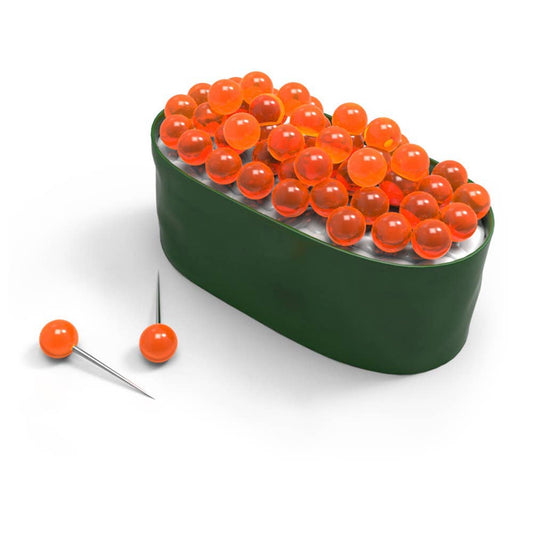 Ikura maki sushi pushpins/thumbtacks -- made to look like maki sushi where the salmon roe on top are actual pushpins