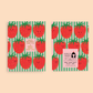 birthday card with a pink and green vertical stripe background with smiley faced big strawberries all over