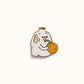 Lapel pin featuring a milk jug drinking an orange out of a straw.