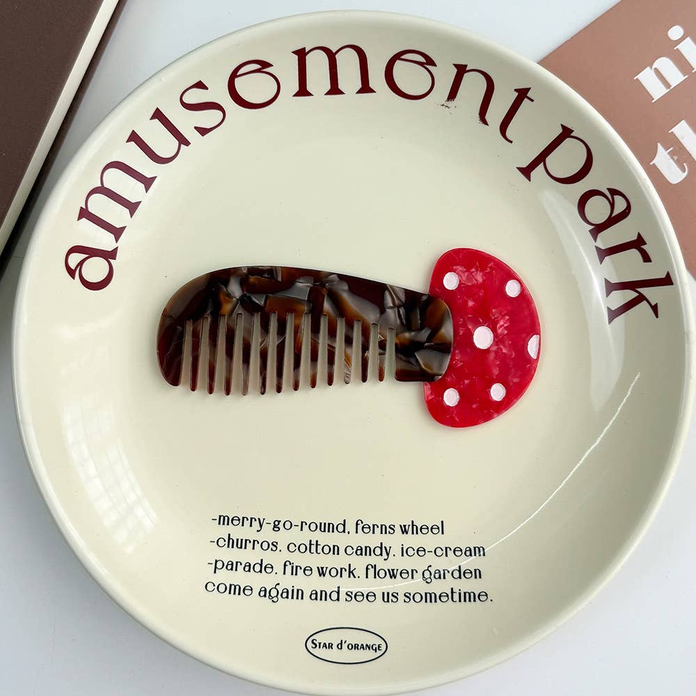 Decorative plate with a mushroom-shaped comb on a 'Amusement Park' theme