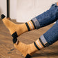 Nachos Socks are on model's feet.
