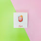 Exterior of front of Negroni matchbook -- designed with a negroni cocktail in center and on bottom flap it reads "Enjoy" 