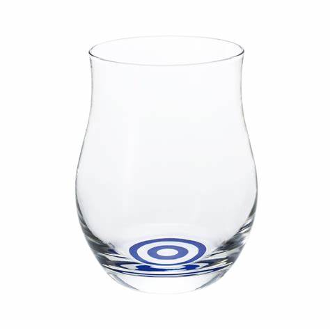Photo of tulip shaped sake tasting glass against white background.