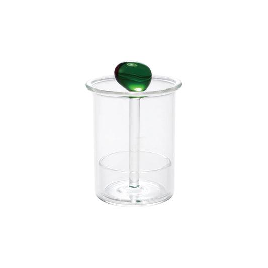 Clear glass container with a green olive lid on a white background