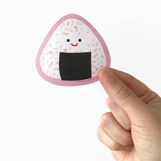 Smiley onigiri vinyl sticker held by hand 