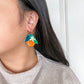 orange dangle earrings for scale 