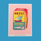 Vintage-style sardine can label with 'Ortiz' branding on a pink and blue background