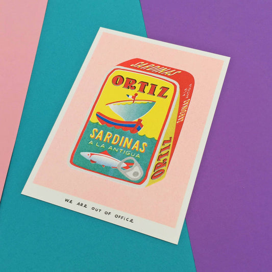 Risograph print with Ortiz Sardinas branding on a sardine can illustration on a colorful background