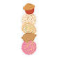 Stack of colorful pastries on a white background