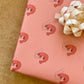 Pink wrapping paper with pink prawns 