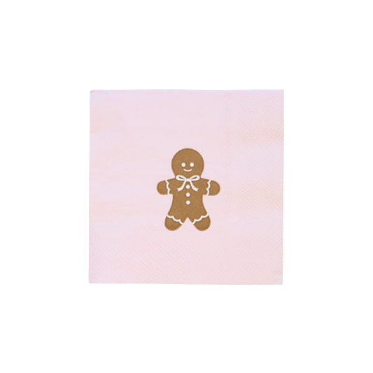 Gingerbread man design on pink paper napkin photgraphed on a white background