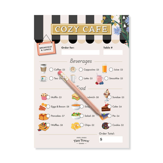 Menu play activity notepad for Cozy Cafe with illustrations of food and drinks, and a pencil on a white background.