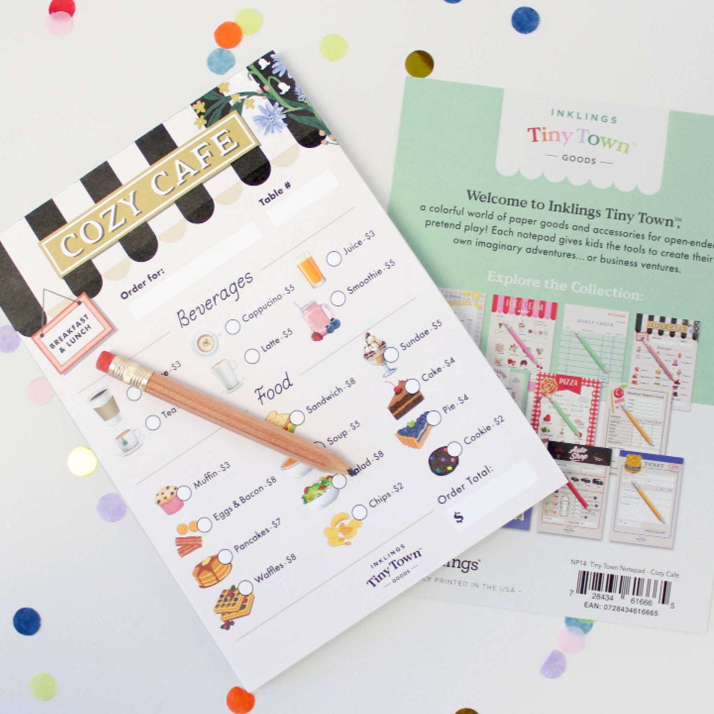 pretend play notepad with 'Cozy Cafe' design on a white background with colorful confetti.