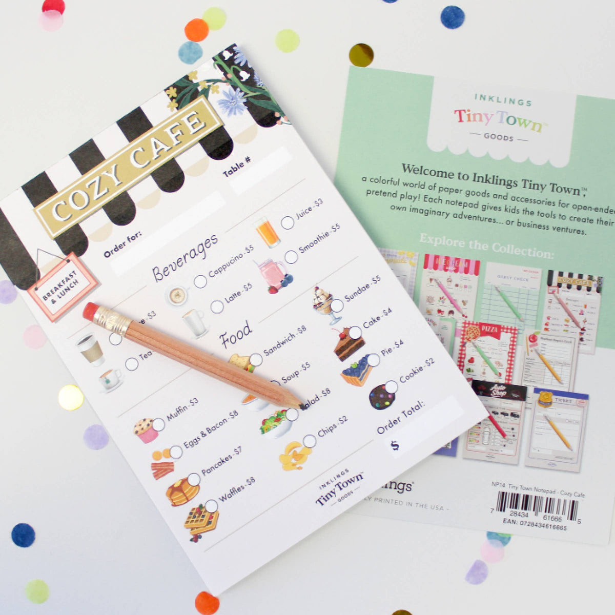 pretend play notepad with 'Cozy Cafe' design on a white background with colorful confetti.