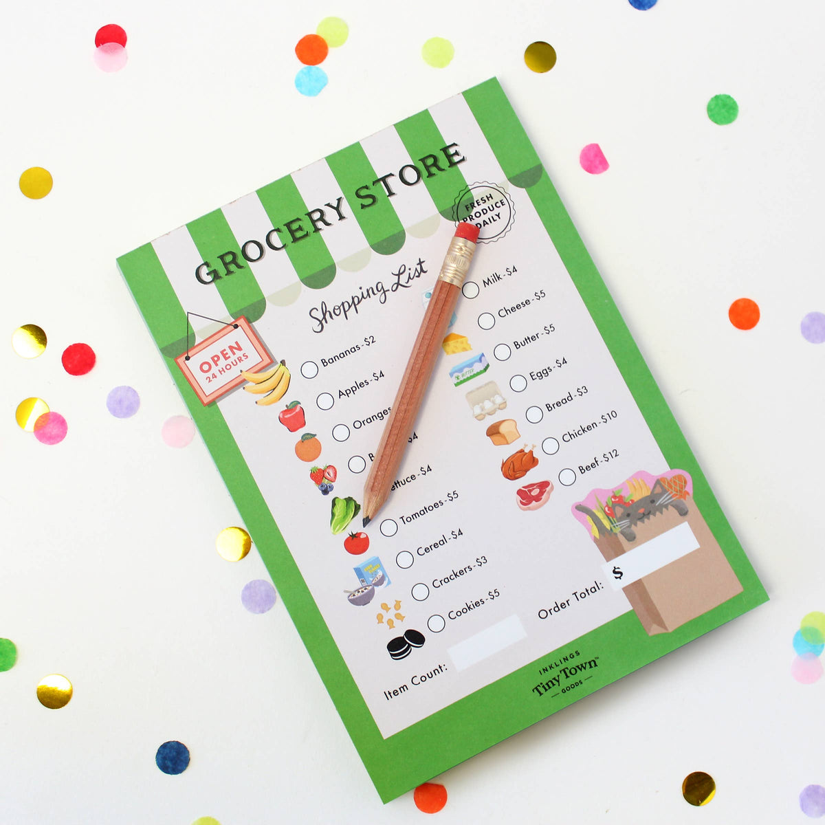 Grocery store shopping list with a pencil on a white background with colorful confetti