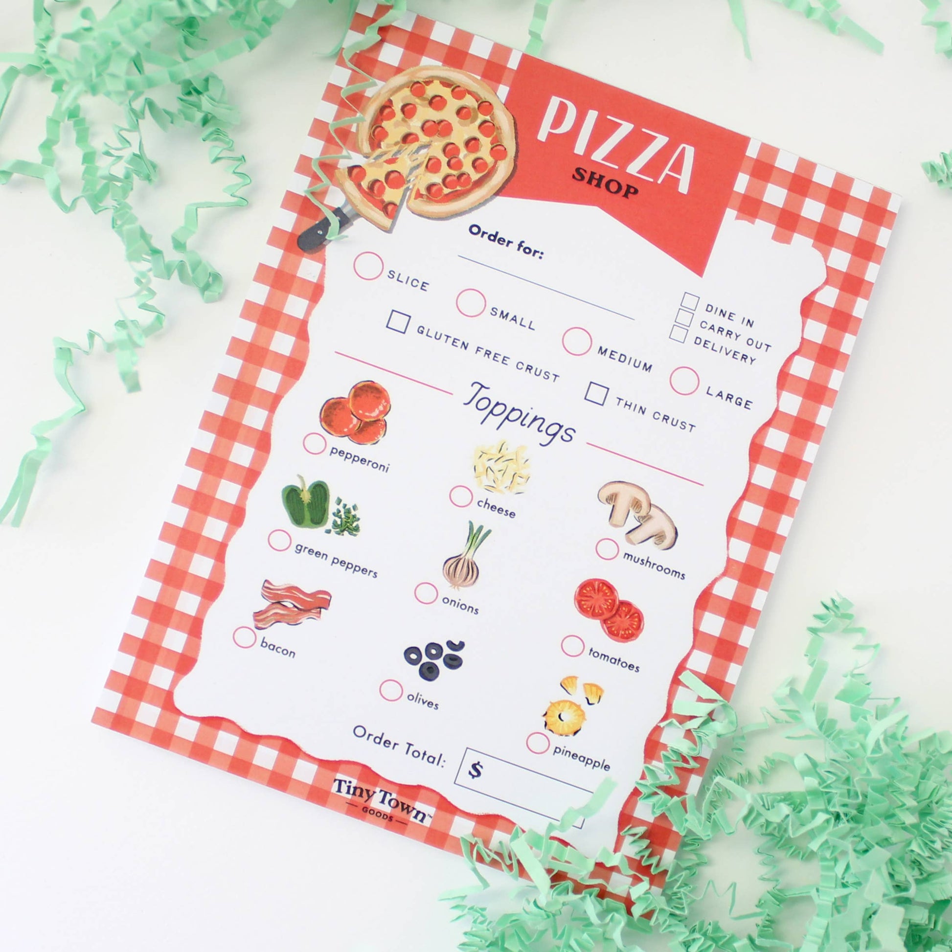 Pizza shop order form with toppings and checkered border on a white background with green decorative elements.