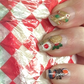 Feast of Seven Fishes themed nail decals  - includes scungilli, clams, calamari, shrimp cocktail, tomato can, chianti bottle, wine glass, christmas bows and holly, and more. Shown on acrylic nails painted with clear polish.