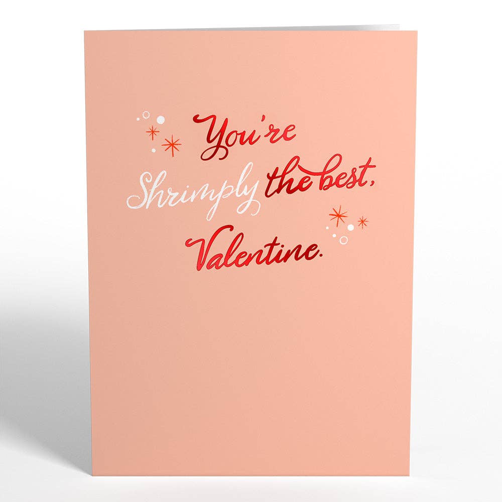 Front of the card that is pink and has scripted words that say "Youre shrimply the best." with asterisks and bubbles.